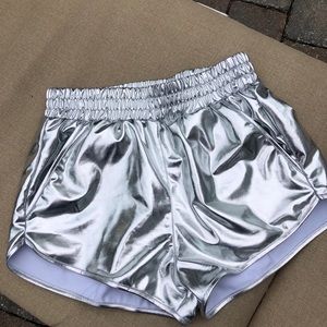 NWOT silver metallic shorts with soft lining